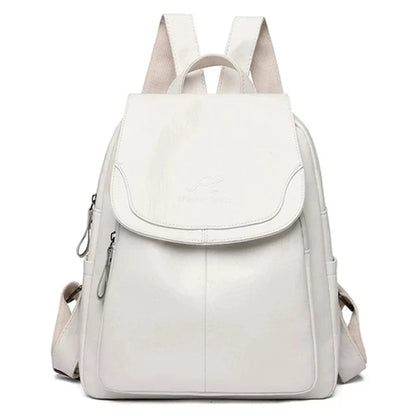 "Zaino in pelle marrone elegante e spazioso con chiusura a cerniera, ideale per donna moderna e multifunzionale."
