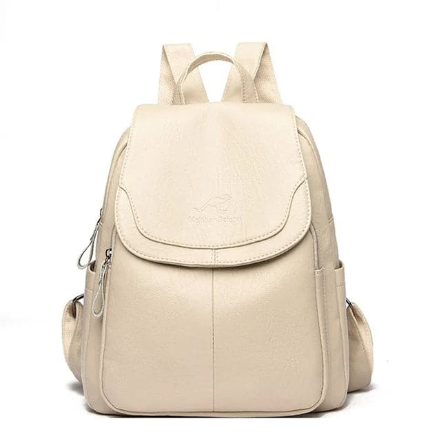 "Zaino in pelle marrone elegante e spazioso con chiusura a cerniera, ideale per donna moderna e multifunzionale."