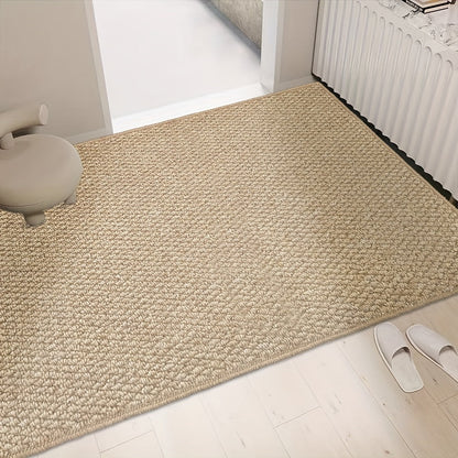 "Zerbino assorbente stile juta con tessuto morbido, colore neutro e base antiscivolo, perfetto per ingressi eleganti."